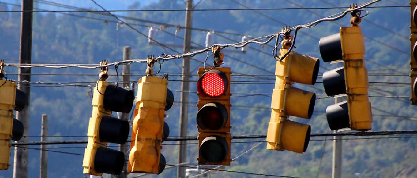 Picture of a traffic light showing red