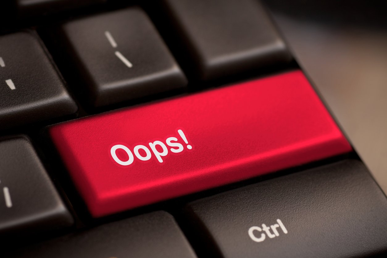image with button that says oops